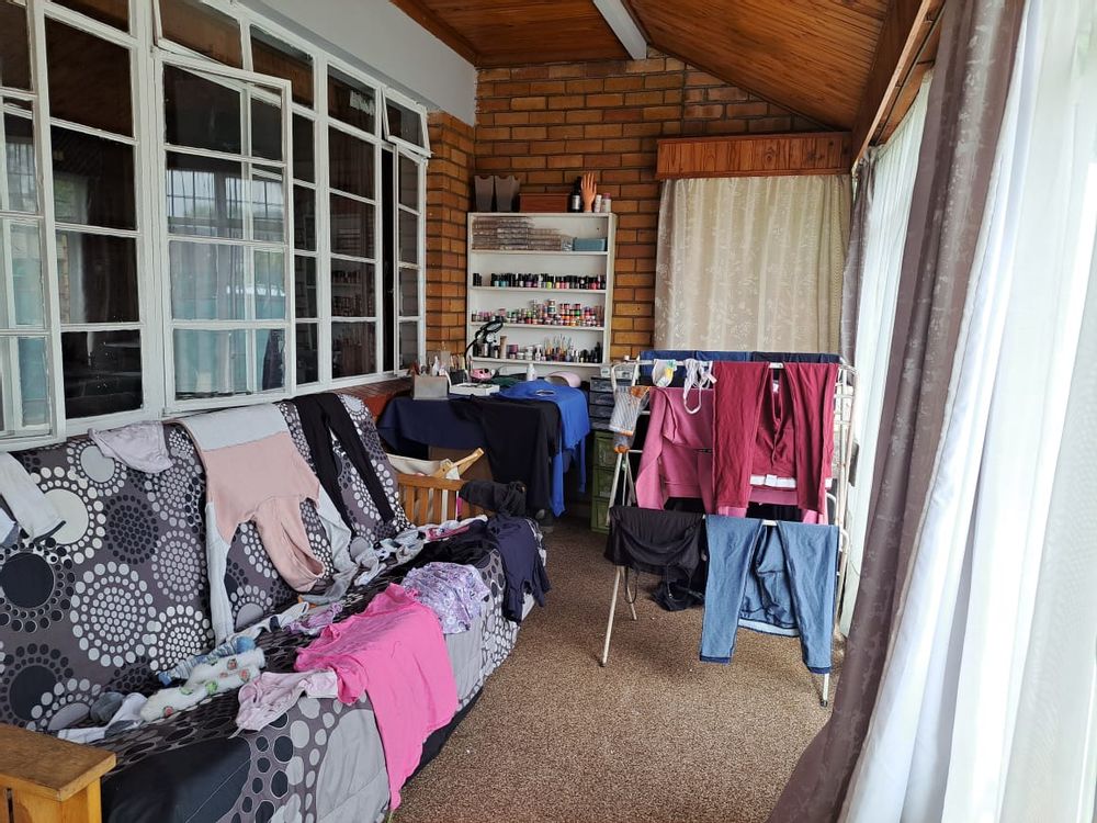 Main home enclosed front veranda