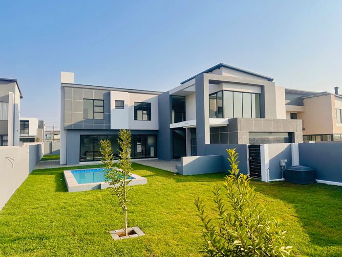 For Sale: Spacious 5-bedroom house in Midstream Heights with pool and entertainment areas.