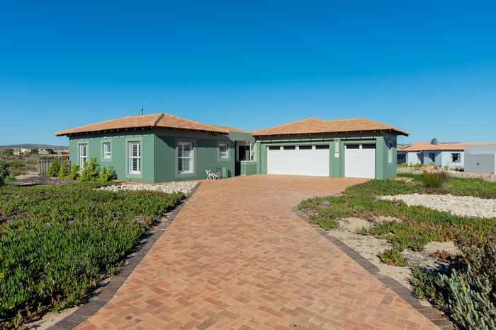 Langebaan Country Estate House For Sale: 4 beds, golf course views, secure living.