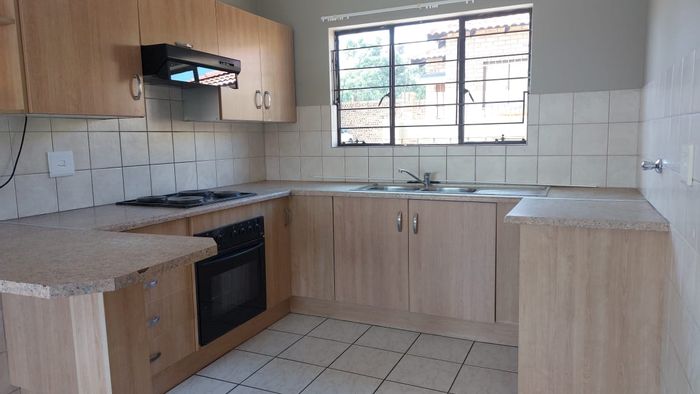 3-Bedroom Townhouse To Rent in Greenhills with private garden and secure parking.