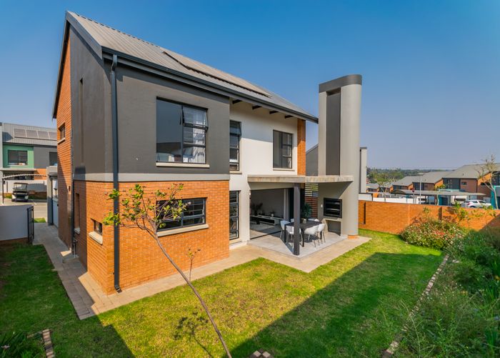 For Sale: Townhouse in Amberfield with 4 beds, 3 baths, and patio braai.