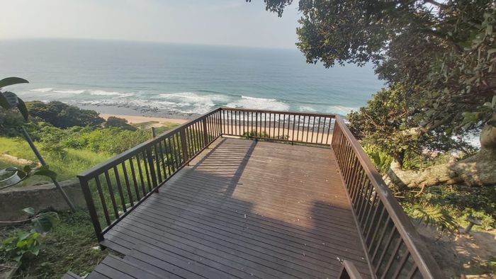 For Sale: Spacious Bluff house with ocean views, 5 bedrooms, multiple decks.