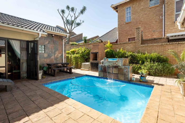 For Sale: House in Amanzimtoti with pool, security, and solar power features.