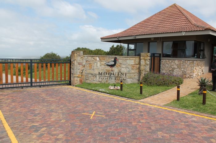 Oceanfront vacant land in Dana Bay for sale with beach access and approved plans.