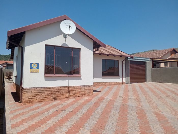 Three-bedroom house in Tlhabane West with garage, JOJO tank, and security. To Rent.