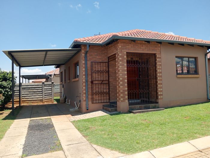 3-Bedroom House To Rent in Waterval East with garden, carport, and secure estate.