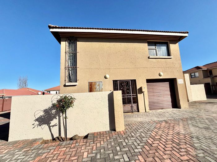 For Sale: 3-Bedroom Townhouse in Secunda Central with garage and open-plan living.