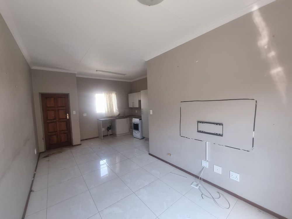 Lounge with kitchen at the back