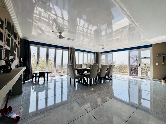 For Sale: Spacious 4-bedroom house in Sable Hills with pool, solar, and garden.