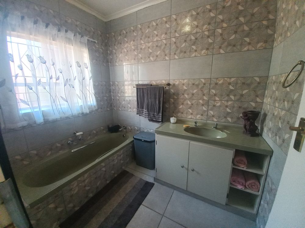 Family bathroom with separate toilet