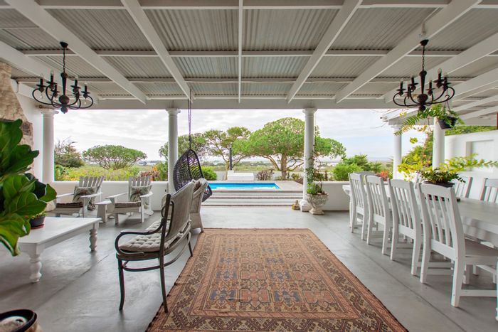 For Sale: Spacious 7-Bedroom House in Paternoster Central with multiple cottages and amenities.