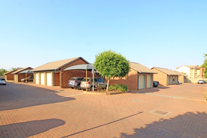 Amberfield Townhouse For Sale: 2 beds, 2 baths, security, garden, playground access.