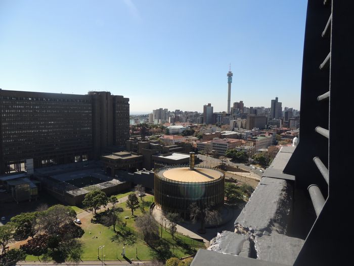 For Sale: 1-Bedroom Apartment in Braamfontein with Hotel Amenities and Secure Access.