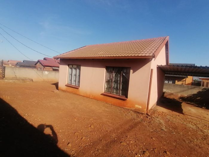 For Sale: 2-bedroom house in Lotus Gardens with open-plan living and corner yard.