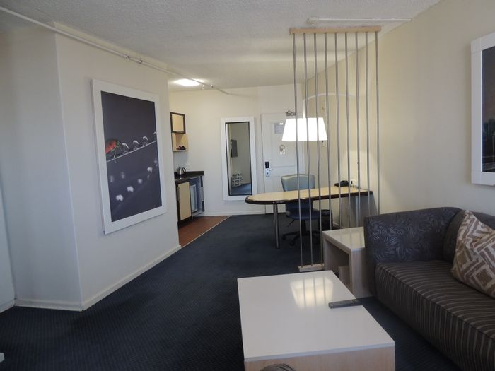Braamfontein Apartment For Sale: 1 Bedroom, kitchenette, hotel amenities, secure access.