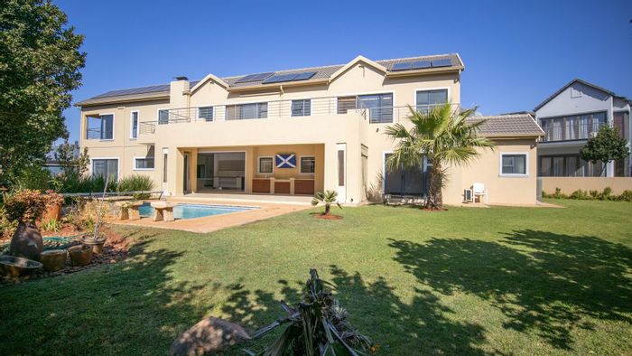For Sale: House in The Coves with pool, solar system, and greenbelt views.
