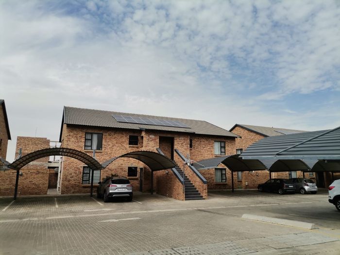 For Sale: 3-Bedroom Townhouse in New Market with Outdoor Patio and Secure Parking.