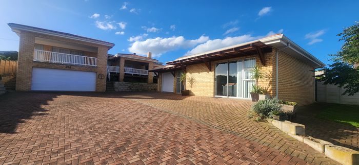 For Sale: Spacious Dana Bay house with flatlet, ocean views, and ample parking.