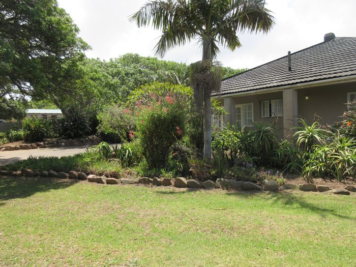 Spacious West Bank house with flat, gardens, and versatile living options for sale.