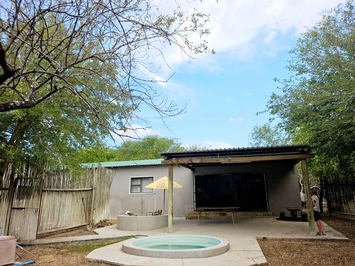 House for Sale in Marloth Park Central: 4 beds, pool, private flat, automated garage.