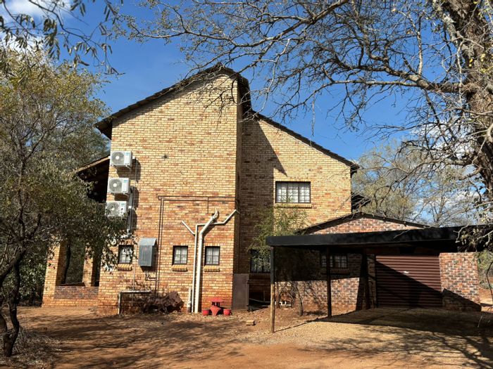 Marloth Park Central House For Sale: 3 bedrooms, pool, parkland views, garage included.