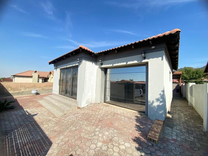 For Sale: House in Tlhabane West with 3 bedrooms, garage, and carport.