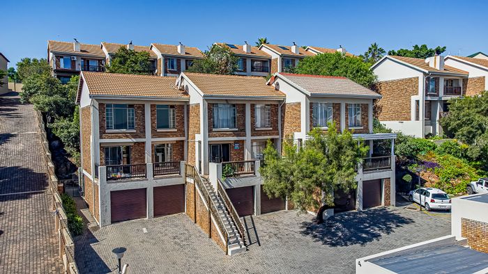 For Sale: Townhouse in La Montagne with 2 bedrooms, garage, and veranda.