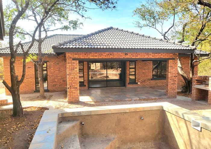 For Sale: House in Marloth Park Central with 3 en-suite bedrooms, pool, and garage.