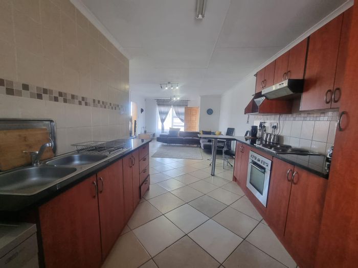 Flat for Sale in Secunda Central: 2 Bedrooms, Built-In Braai, Covered Parking.
