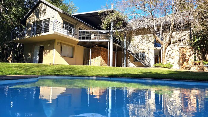 For Sale: Spacious Cashan House with pool, gym, flats, and extensive gardens.