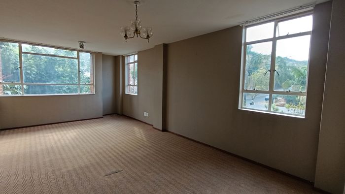 For Sale: Apartment in Wonderboom South with 2 bedrooms, communal braai area, secure access.