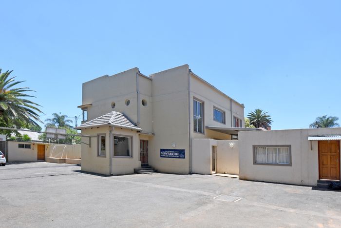 Highlands North House For Sale: Dual-use property with expansive land and income potential.