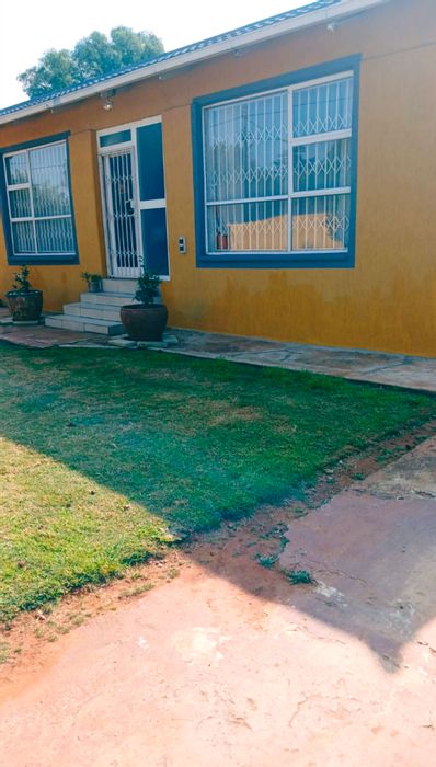 For Sale: House in Selection Park with flatlet, spacious yard, and carport.