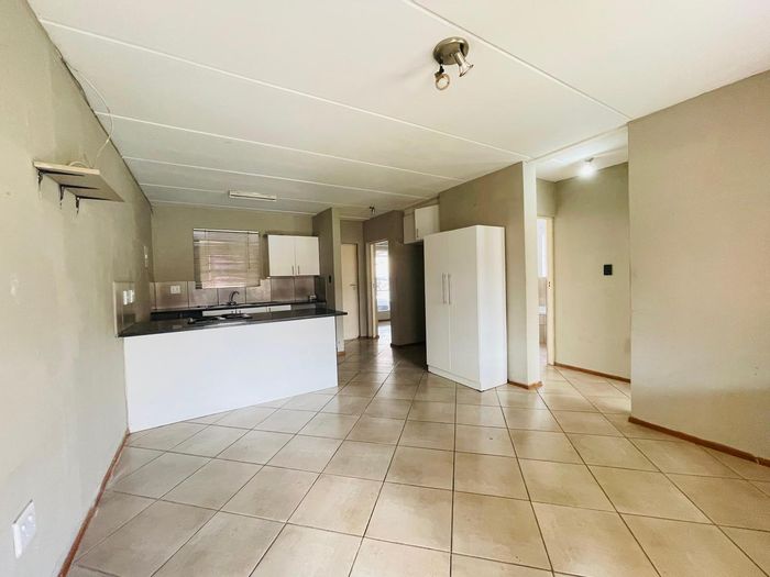 For Sale: 2-Bedroom Townhouse in Albertsdal with Private Garden and Secure Complex.