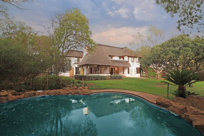 For Sale: Four-bedroom house in Kyalami AH with equestrian access and spacious grounds.