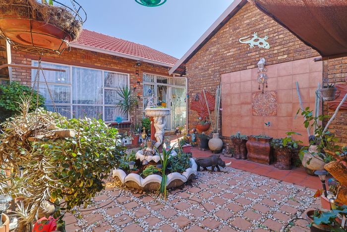 For Sale: 3-Bedroom Townhouse in Alberton North with double garages and pet-friendly gardens.