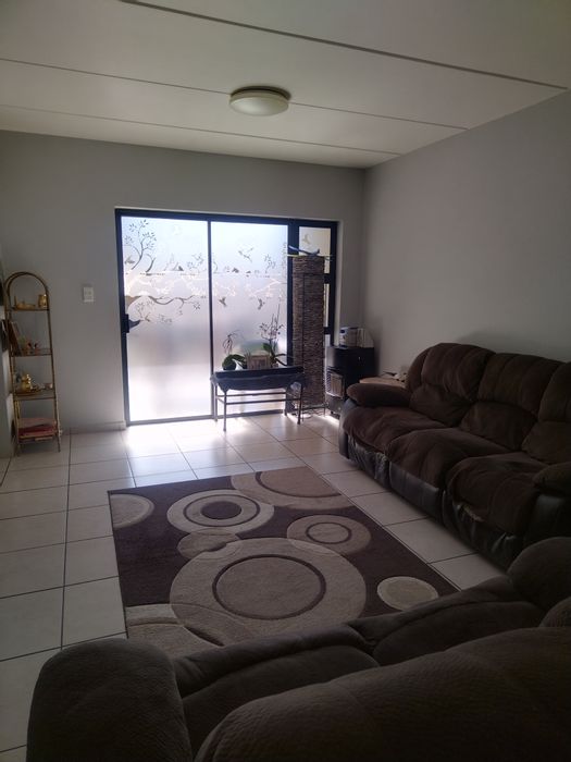 For Sale: 2-Bedroom Apartment in Brentwood with Parking and Private Balcony.