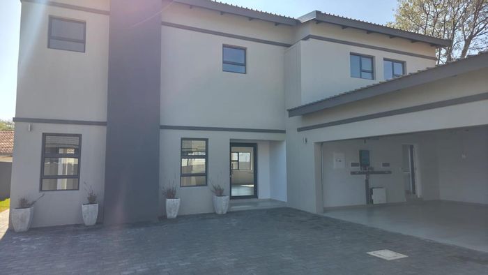 For Sale: House in Lynnwood Glen with 4 bedrooms, study, and patio braai area.