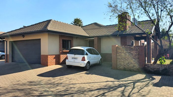 For Sale: Equestria Townhouse with 3 bedrooms, pool, security, and garage.