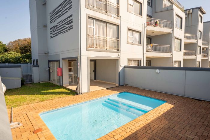 1-Bedroom Apartment For Sale in Athlone Park with pool and 24-hour security.