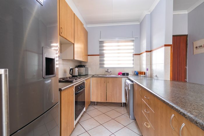 For Sale: 2-Bedroom Apartment in Sagewood with secure parking and communal gardens.