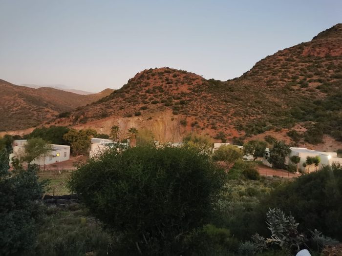 Barrydale Central House For Sale: Secure share-block, pool, tennis courts, wildlife views.