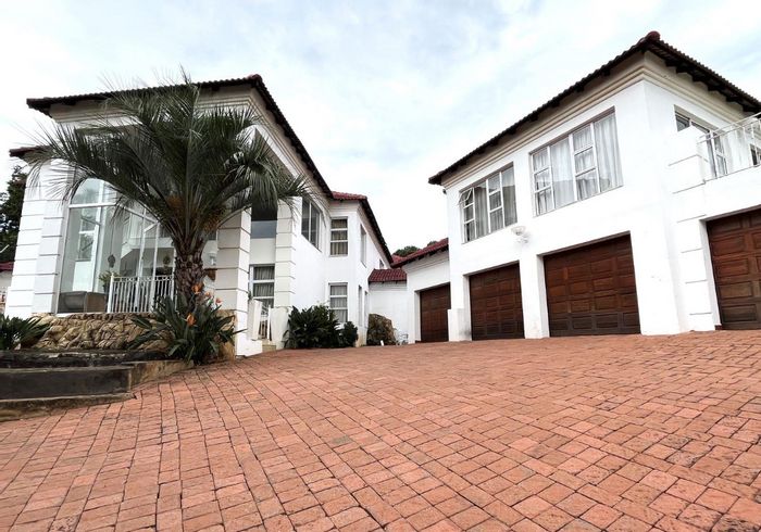 For Sale: Spacious Waterkloof Ridge house with pool, flatlet, and expansive garden.