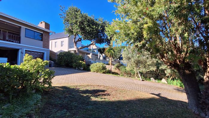 For Sale: Spacious 4-Bedroom House in Stilbaai Oos with River Views and Garages.