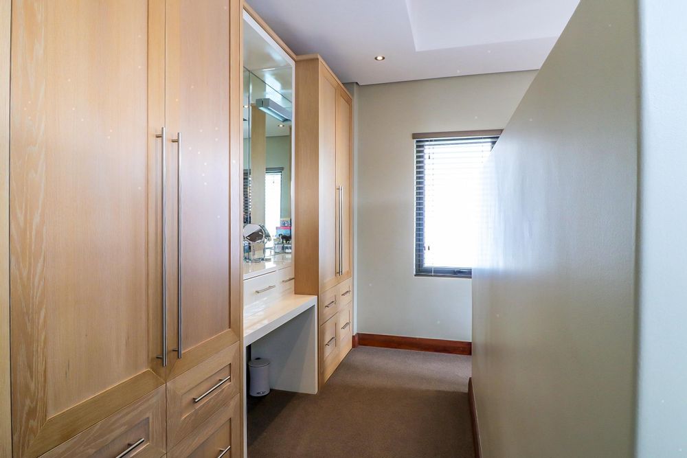 Main bedroom cupboard space and dressing table