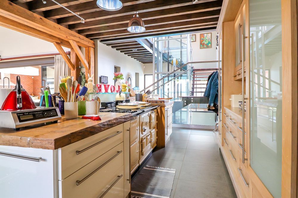 Kitchen island has a solid wood island