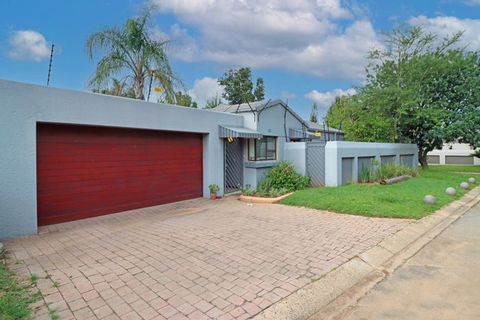 For Sale: Cluster in Magaliessig with garden, double garage, and secure estate access.