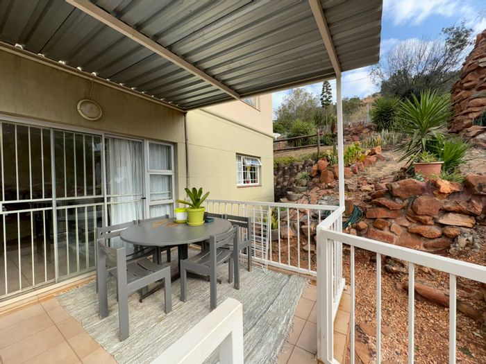 Boschdal Townhouse For Sale: Spacious 3-bed, double garage, ample outdoor space.