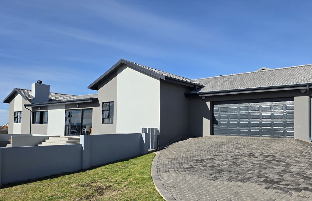 Garage & paved driveway