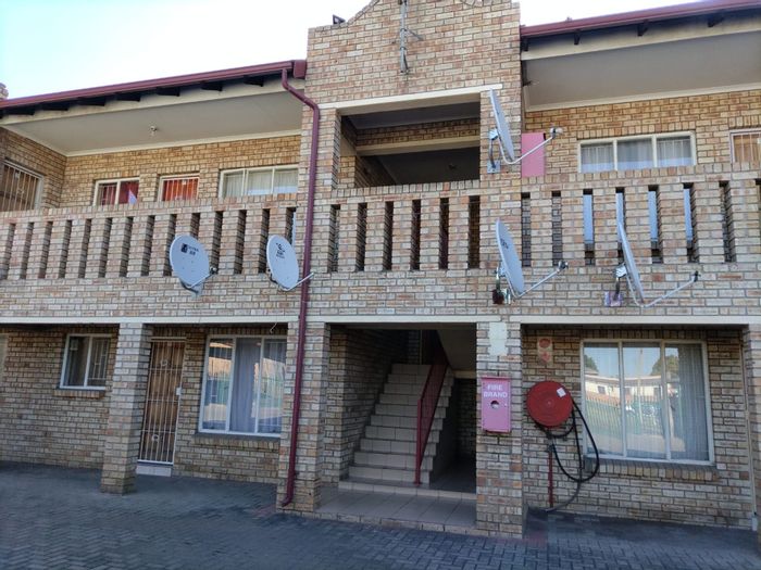 1-Bedroom Flat For Sale in Rustenburg Central, secure complex, close to amenities.